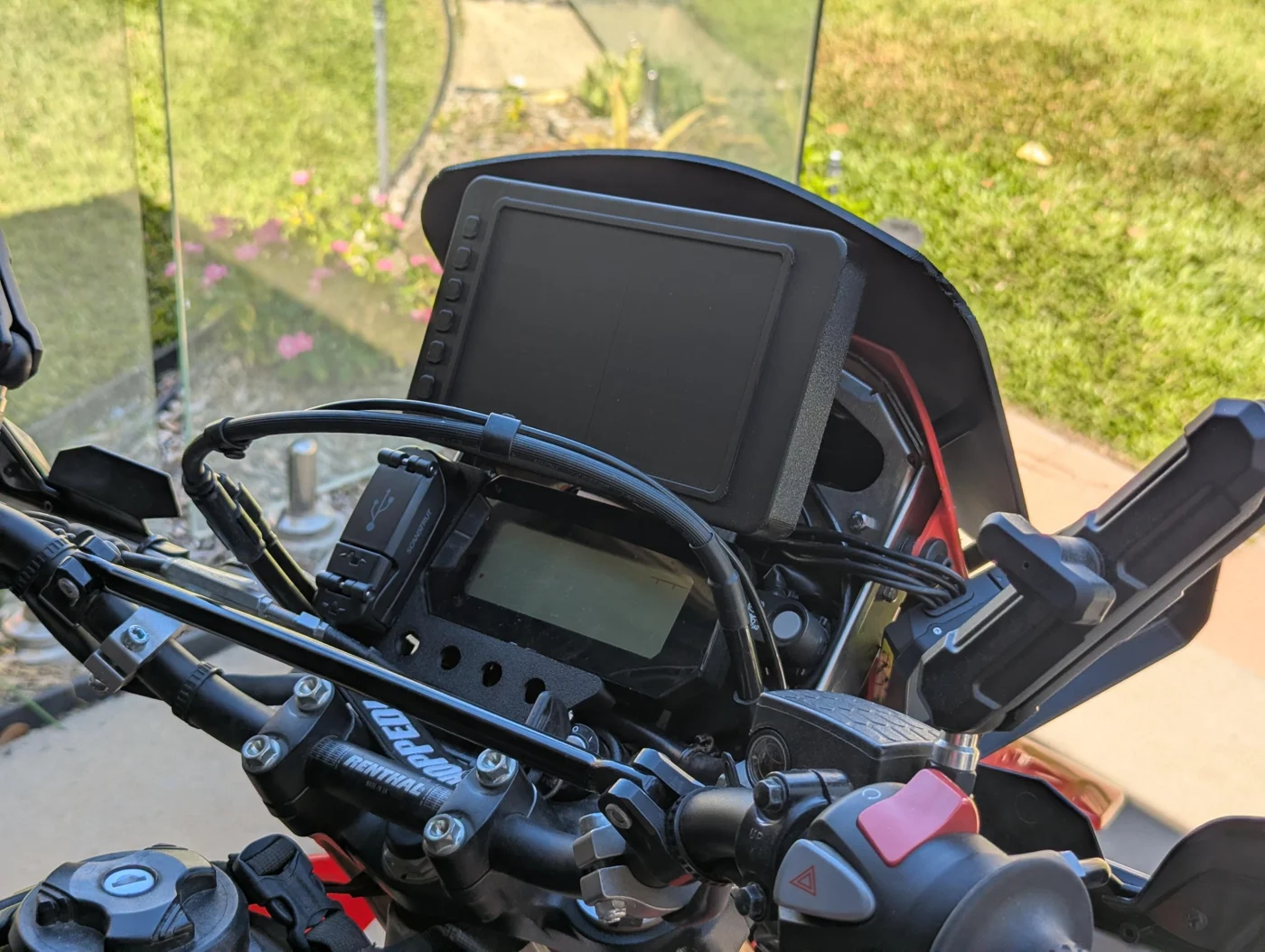 C1 rider-side prototype with a tablet mock-up above the original instrument cluster